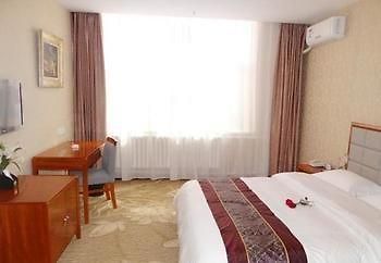 Yuangu Town Business Hotel Qingdao Esterno foto