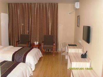 Yuangu Town Business Hotel Qingdao Esterno foto